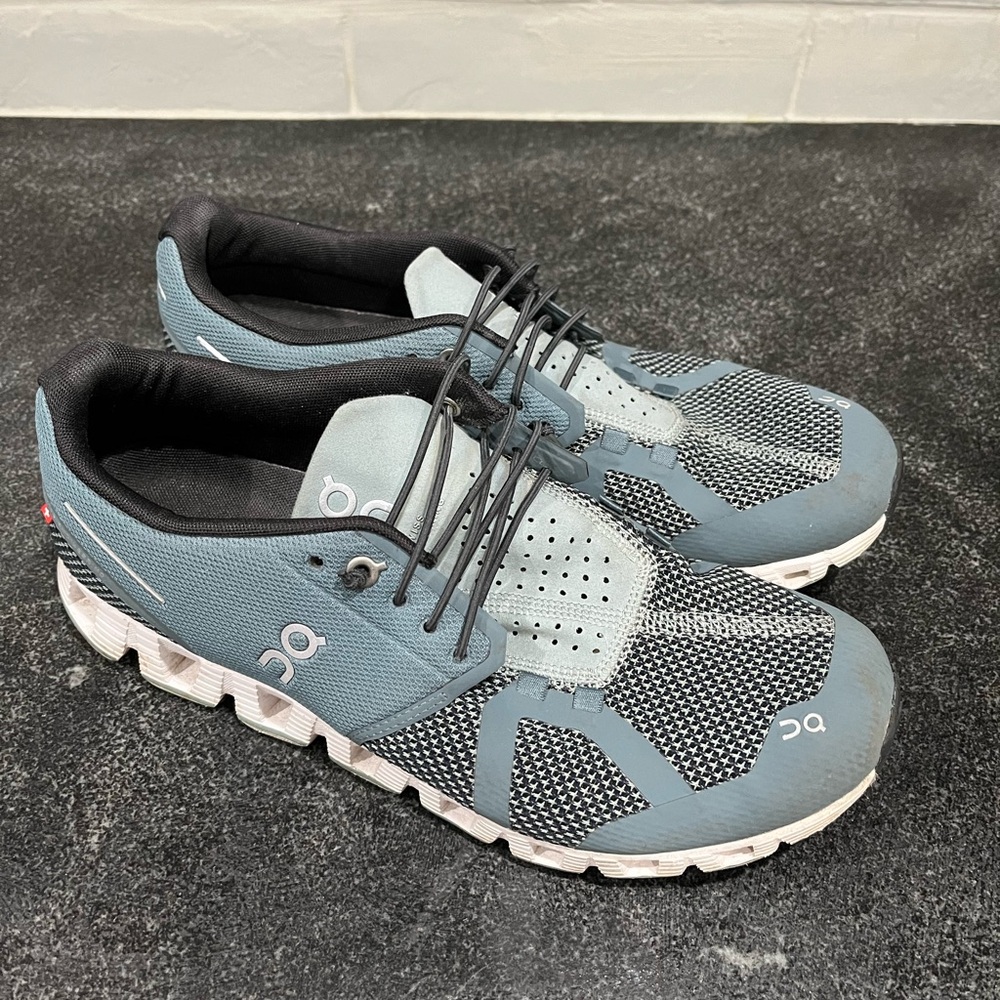 On Running Blue and Black Athletic Shoes